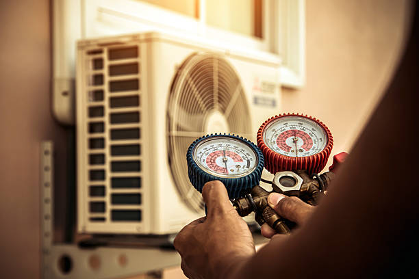 Professional Hvac technician working in Tom Bean, TX